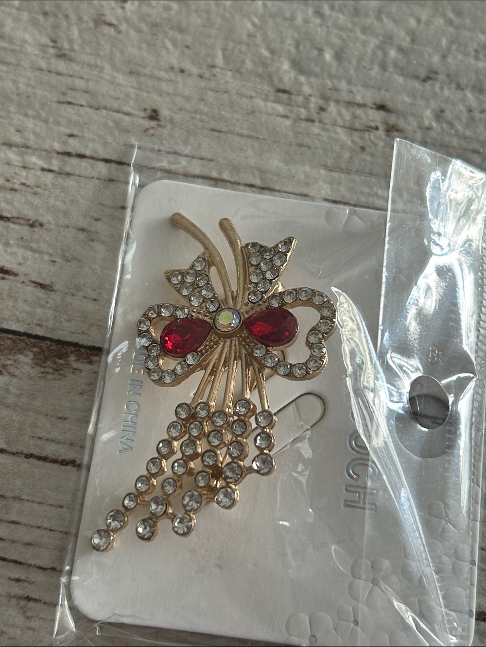 🔥$2 Gold-tone Rhinestone Bow Brooch with Red Gem Accents